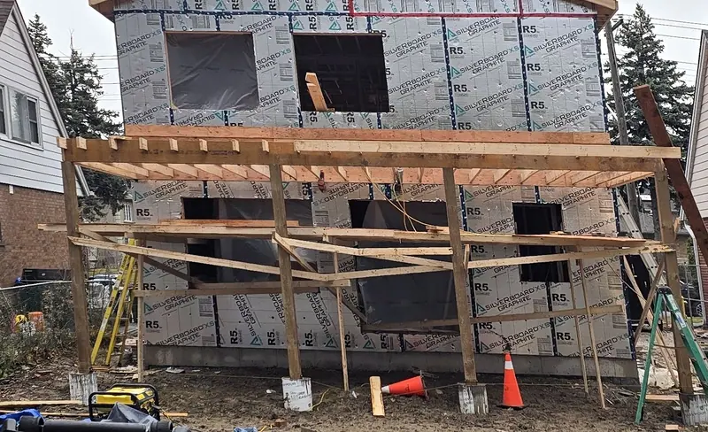 Exterior rigid insulation scaffolding home