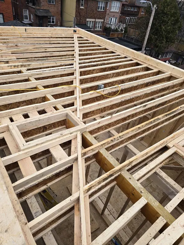Flat roof joist framing urban infill