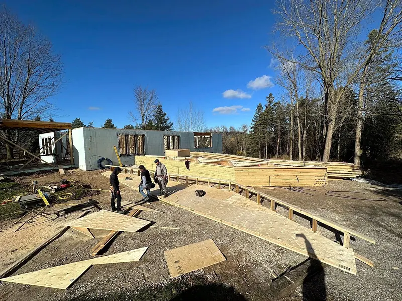 Framing crew subfloor wall panels new home