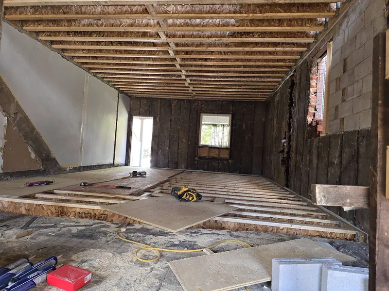 Interior gut renovation floor joist repair