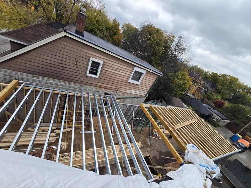 Rear addition steel framing existing house