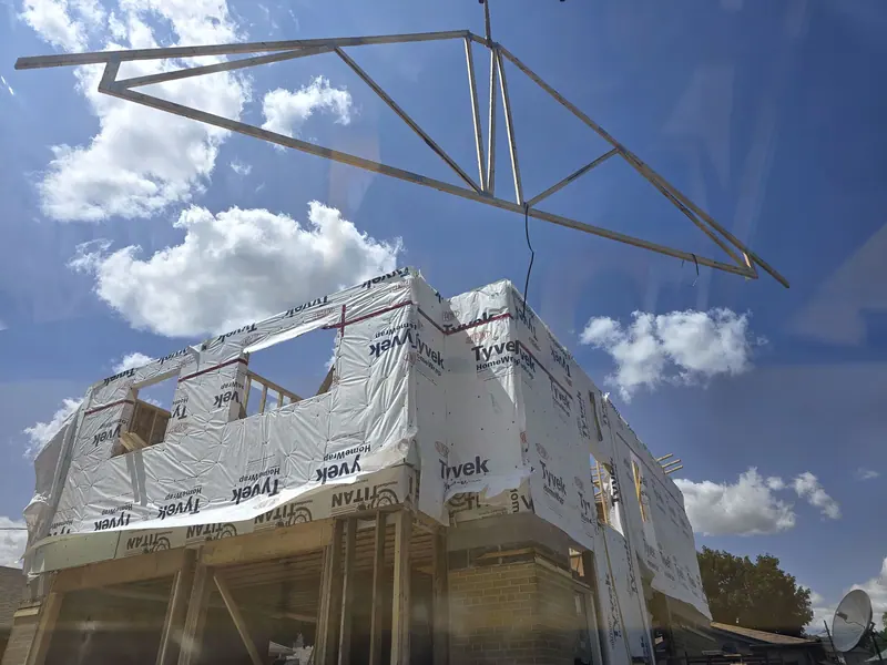 Roof truss crane lift second storey