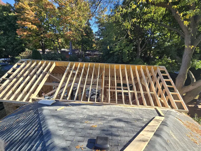 Second storey framing over existing roof