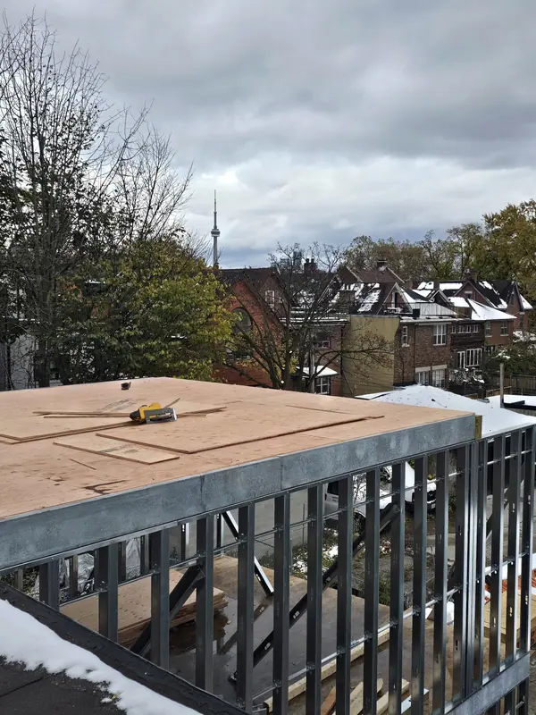 Steel stud walls roof deck city view