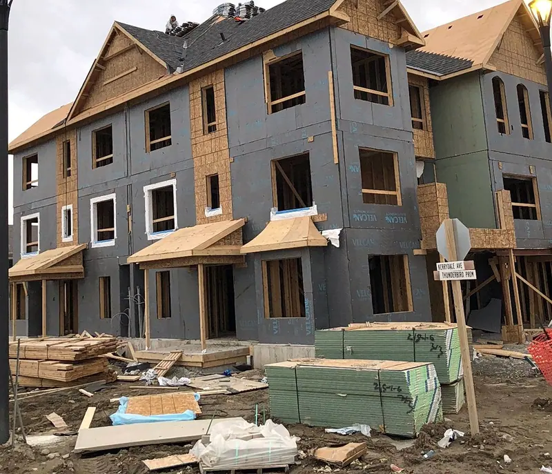 Townhomes exterior sheathing window installation