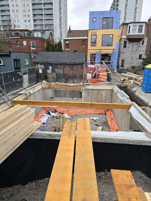 Urban infill foundation beam installation